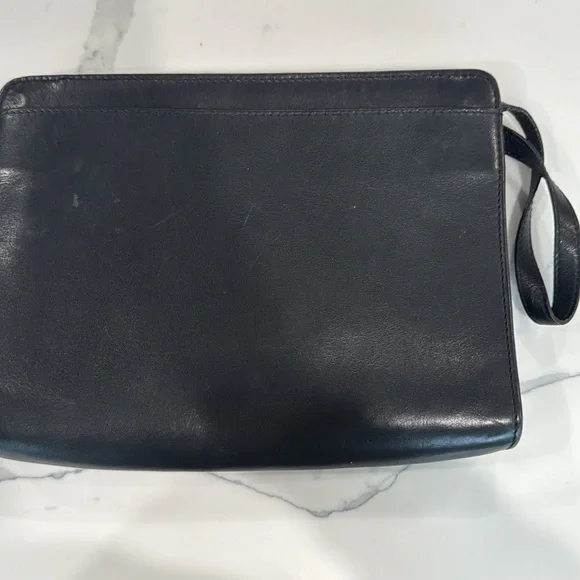 Celine clutch with wrist strap 8x11 in very good used condition